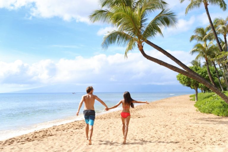 A happy couple on  Kaaanapali beach, Maui, USA.